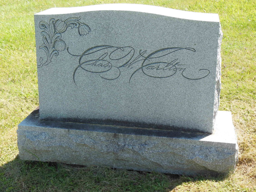 Carlton's headstone in Oakwood Cemetery in Syracuse, NY.